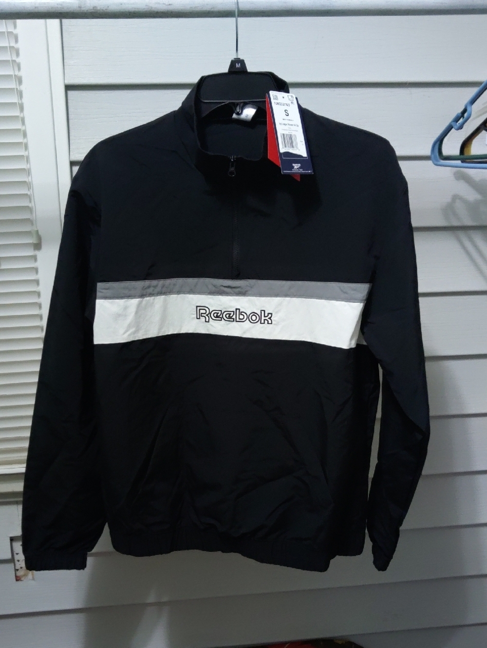 Reebok Black Windbreaker with White Chest Stripe